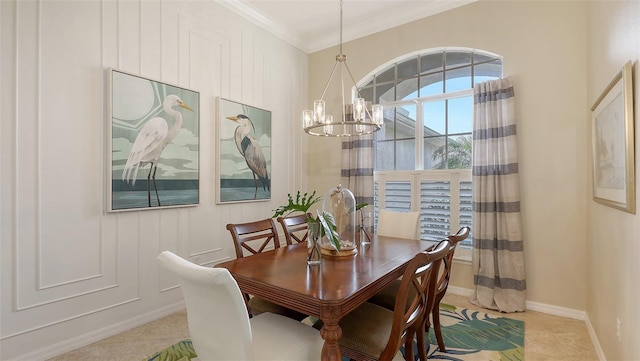 dining space with light tile patterned flooring, a notable chandelier, and crown molding