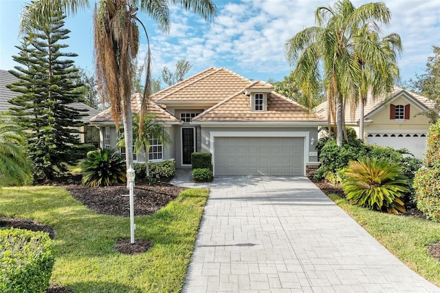 view of front of property featuring a garage