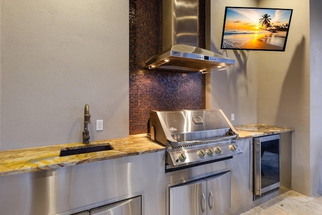 kitchen with sink, backsplash, beverage cooler, and island range hood