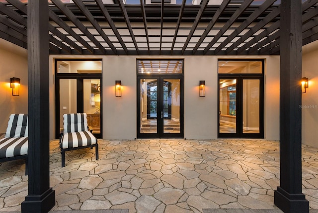 view of patio / terrace featuring a pergola and french doors