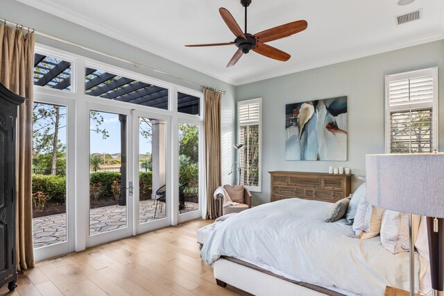 bedroom with ceiling fan, crown molding, light hardwood / wood-style flooring, and access to outside