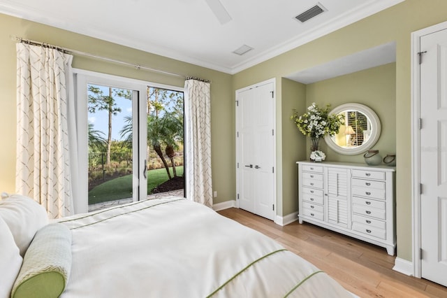 bedroom with ornamental molding, ceiling fan, access to exterior, and light hardwood / wood-style floors