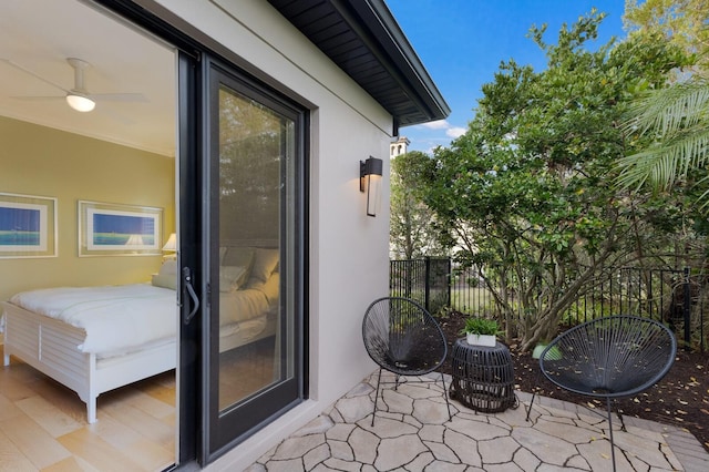 balcony featuring ceiling fan