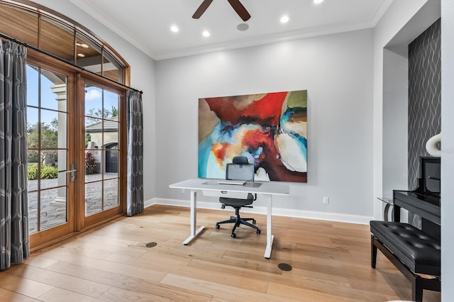 home office with crown molding, light hardwood / wood-style floors, and ceiling fan