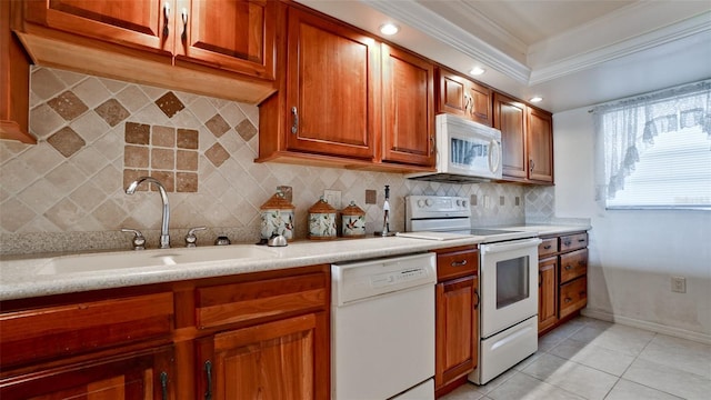 kitchen featuring white appliances, sink, decorative backsplash, ornamental molding, and light tile patterned floors