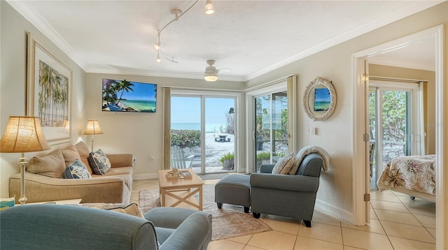5311 Gulf Of Mexico Dr Unit 3, Longboat Key, FL 34228 - living room with light tile patterned floors, baseboards, crown molding, and ceiling fan