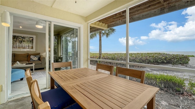 5311 Gulf Of Mexico Dr Unit 3, Longboat Key, FL 34228 - sunroom with outdoor dining space