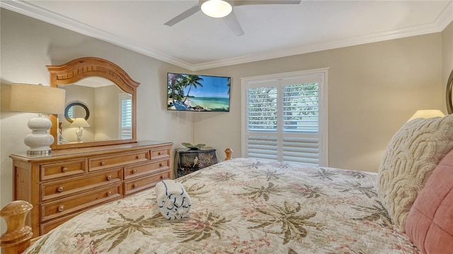 5311 Gulf Of Mexico Dr Unit 3, Longboat Key, FL 34228 - bedroom featuring ornamental molding and a ceiling fan