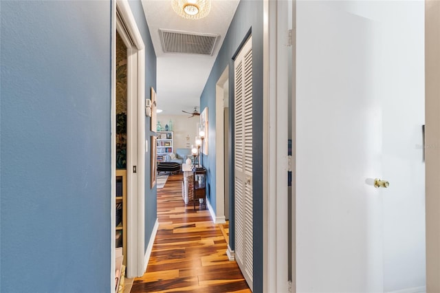 hallway featuring light wood-type flooring