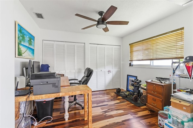 office space featuring hardwood / wood-style floors and ceiling fan