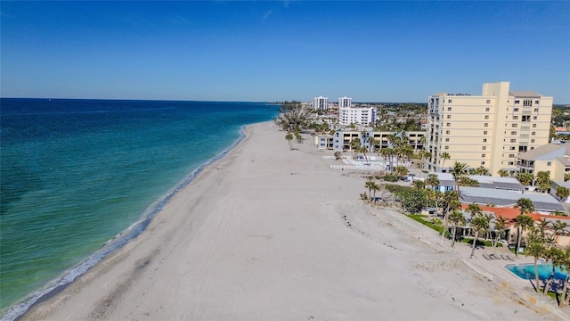 drone / aerial view with a view of the beach and a water view