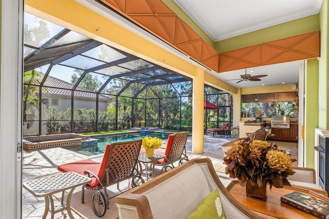 view of pool with an in ground hot tub, exterior kitchen, glass enclosure, grilling area, and a patio