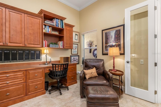 office featuring light tile patterned floors, built in desk, and ornamental molding