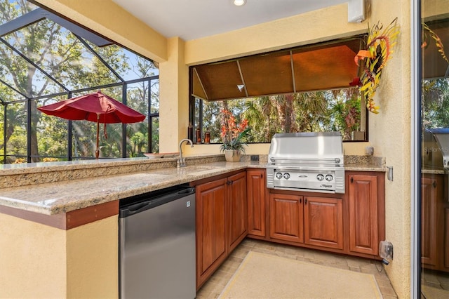 view of patio with a lanai, area for grilling, an outdoor wet bar, and grilling area