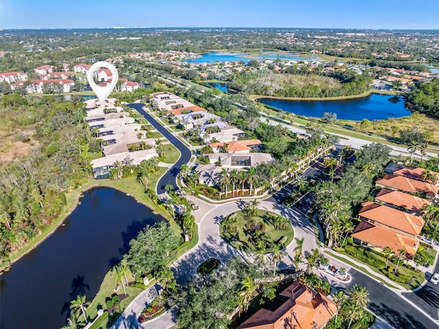 drone / aerial view with a water view