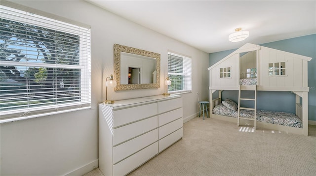 bedroom with light carpet