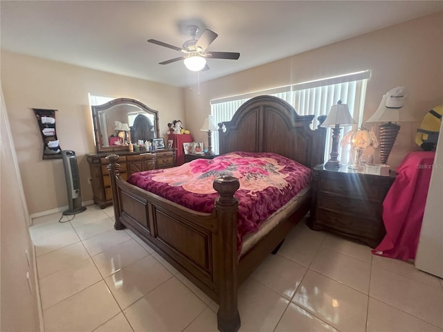 bedroom featuring ceiling fan and light tile patterned flooring