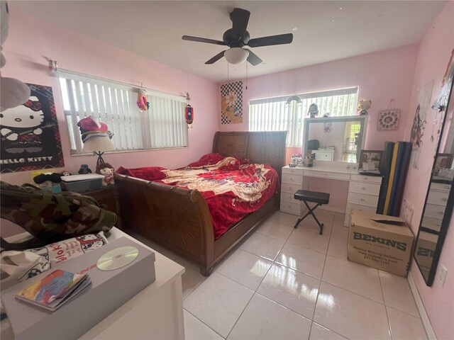 bedroom featuring ceiling fan and light tile patterned floors