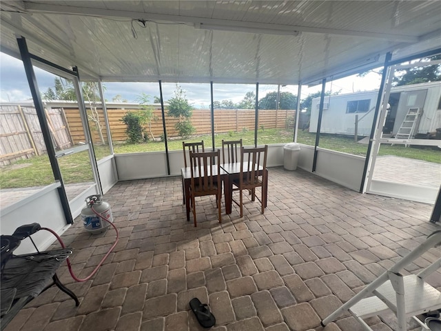 sunroom / solarium with a wealth of natural light