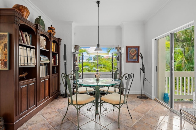 dining room featuring ornamental molding