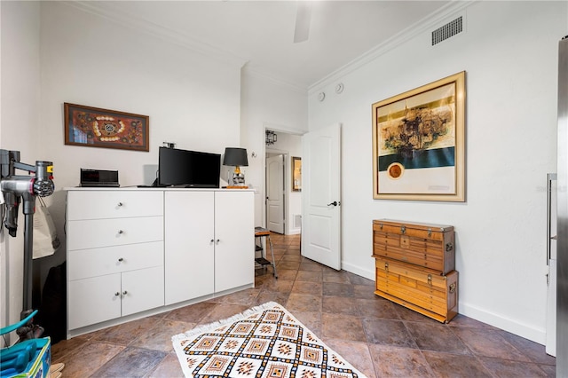 bedroom with ceiling fan and ornamental molding