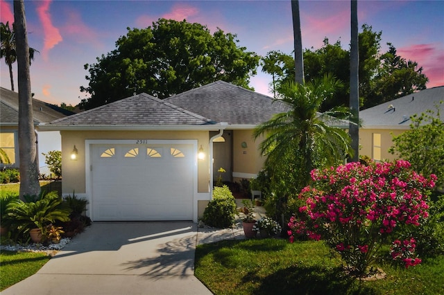 view of front of home with a garage