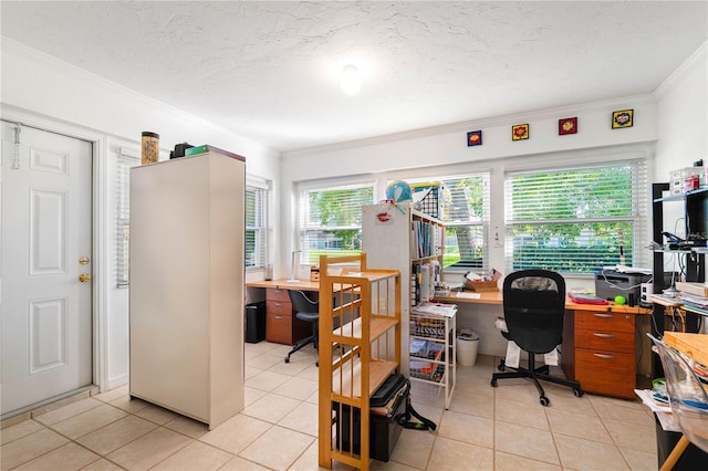 home office with light tile patterned flooring, a textured ceiling, and ornamental molding