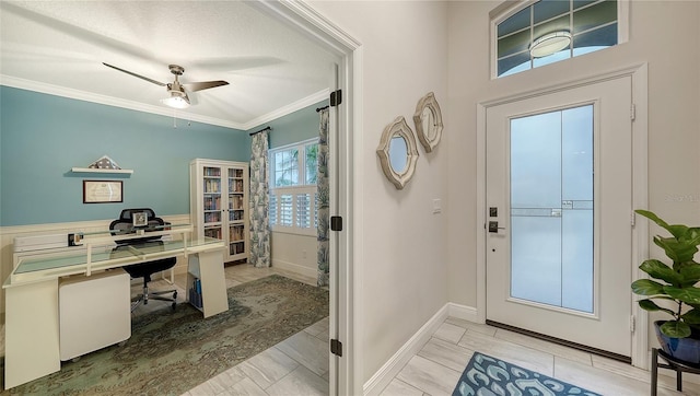 interior space featuring a textured ceiling, ceiling fan, and crown molding