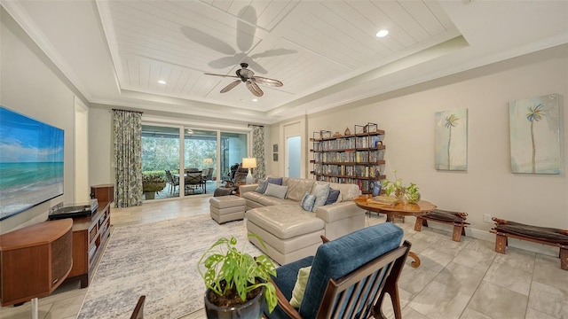 living room featuring crown molding, ceiling fan, a tray ceiling, and wood ceiling