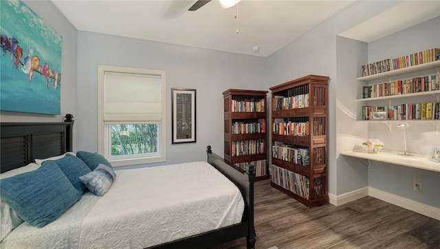 bedroom featuring dark wood-type flooring and ceiling fan