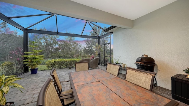 patio terrace at dusk with glass enclosure