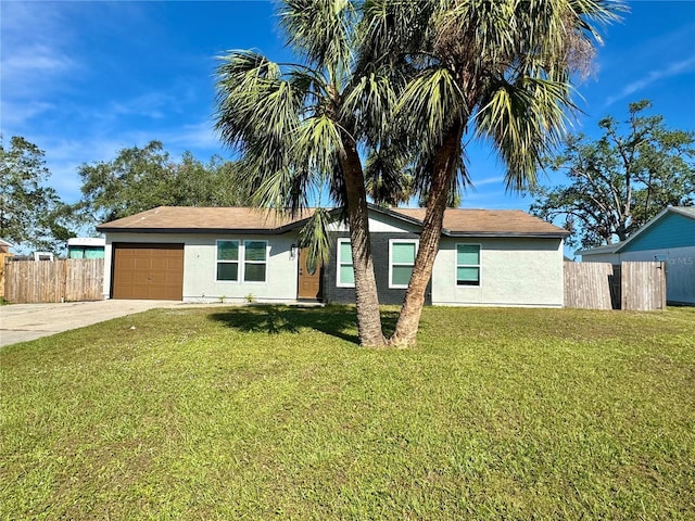 ranch-style house with a front lawn and a garage