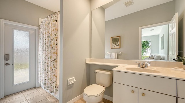 full bath with visible vents, toilet, ensuite bath, tile patterned floors, and vanity