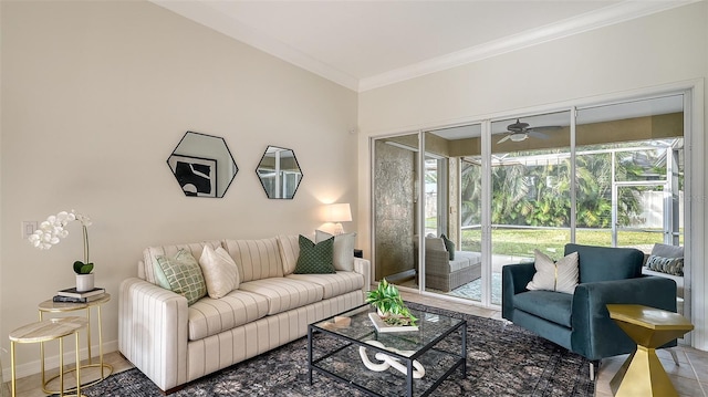 living room featuring a sunroom, ornamental molding, a ceiling fan, and baseboards