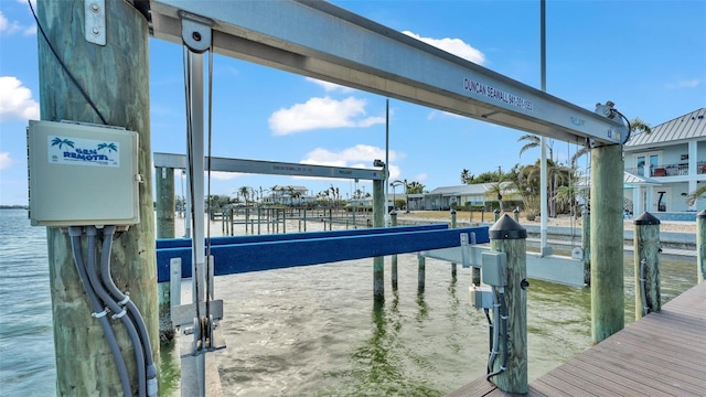 dock area with a water view