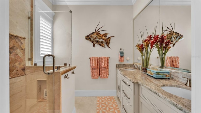 bathroom with tile patterned floors and vanity