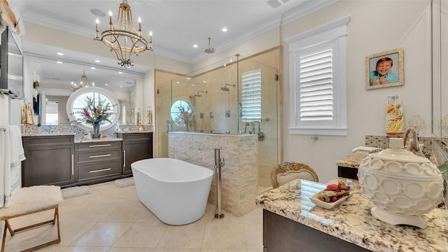 bathroom featuring independent shower and bath, vanity, crown molding, and plenty of natural light