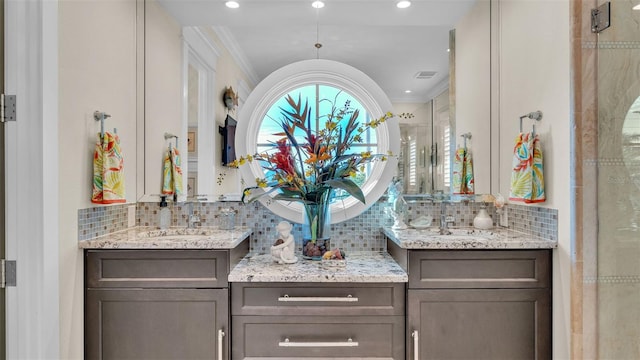 bar with crown molding, backsplash, and sink