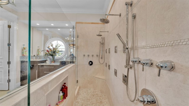 bathroom featuring an enclosed shower and crown molding