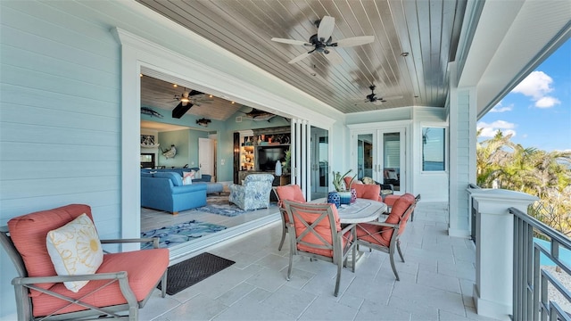 view of patio featuring ceiling fan and an outdoor hangout area