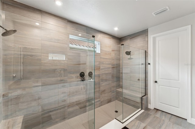 bathroom featuring walk in shower