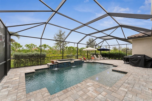 view of pool with glass enclosure, grilling area, pool water feature, an in ground hot tub, and a patio area