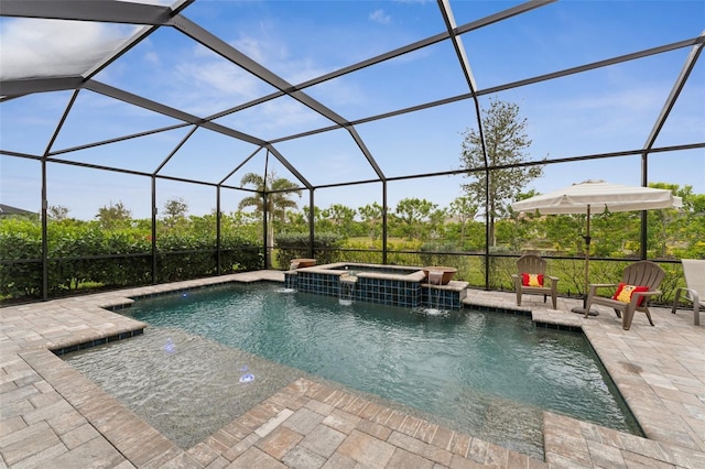 view of swimming pool with an in ground hot tub, a patio, pool water feature, and glass enclosure