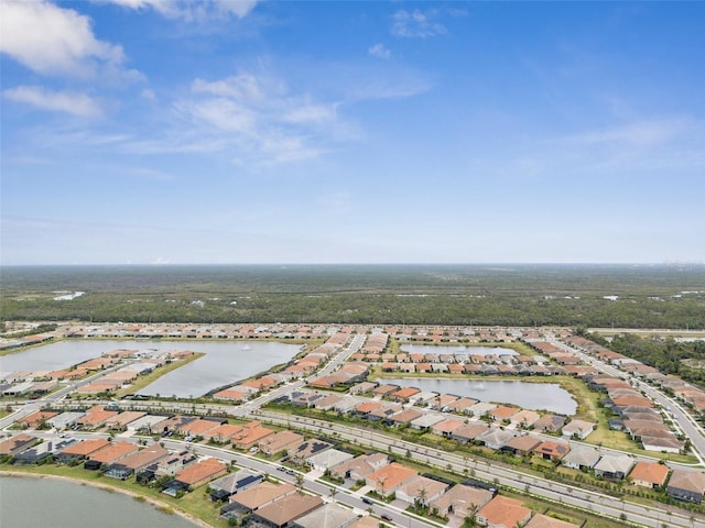 drone / aerial view with a water view