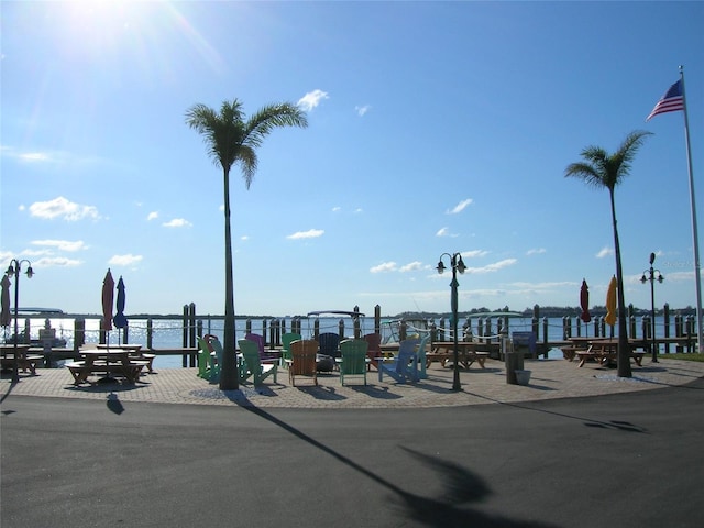 view of home's community with a water view