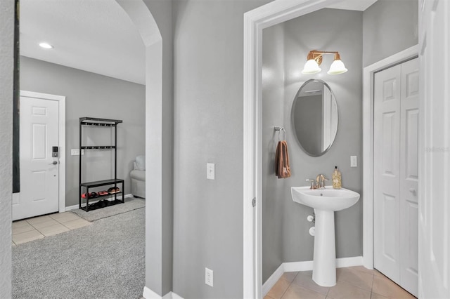 bathroom with tile patterned flooring