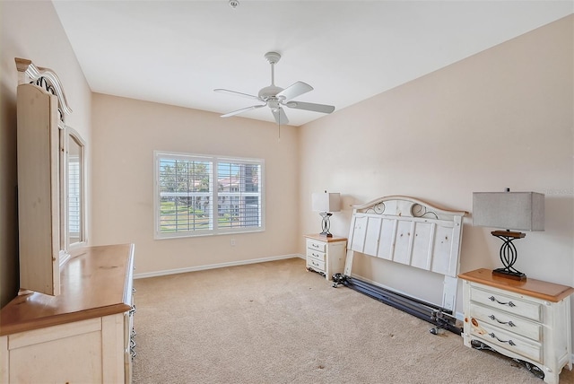 bedroom featuring ceiling fan and light colored carpet