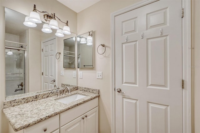 bathroom featuring vanity and walk in shower