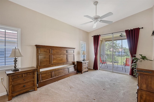 sitting room featuring ceiling fan, light colored carpet, and vaulted ceiling