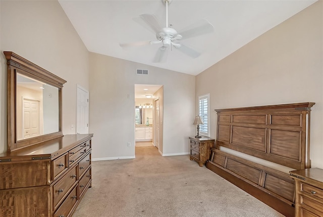 carpeted bedroom featuring connected bathroom, ceiling fan, and lofted ceiling